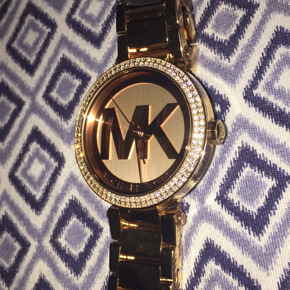 MK women’s rose gold watch